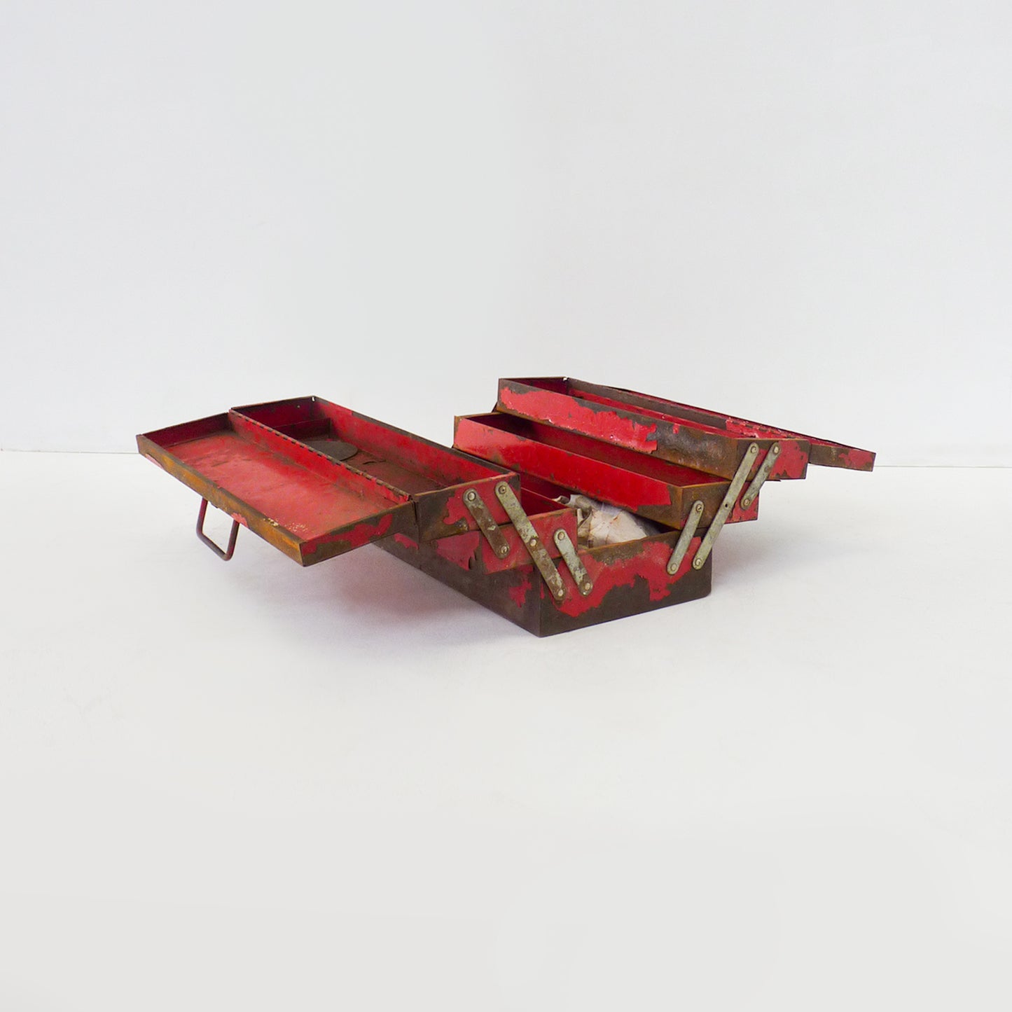 Aged Red Metal Expanding Toolbox