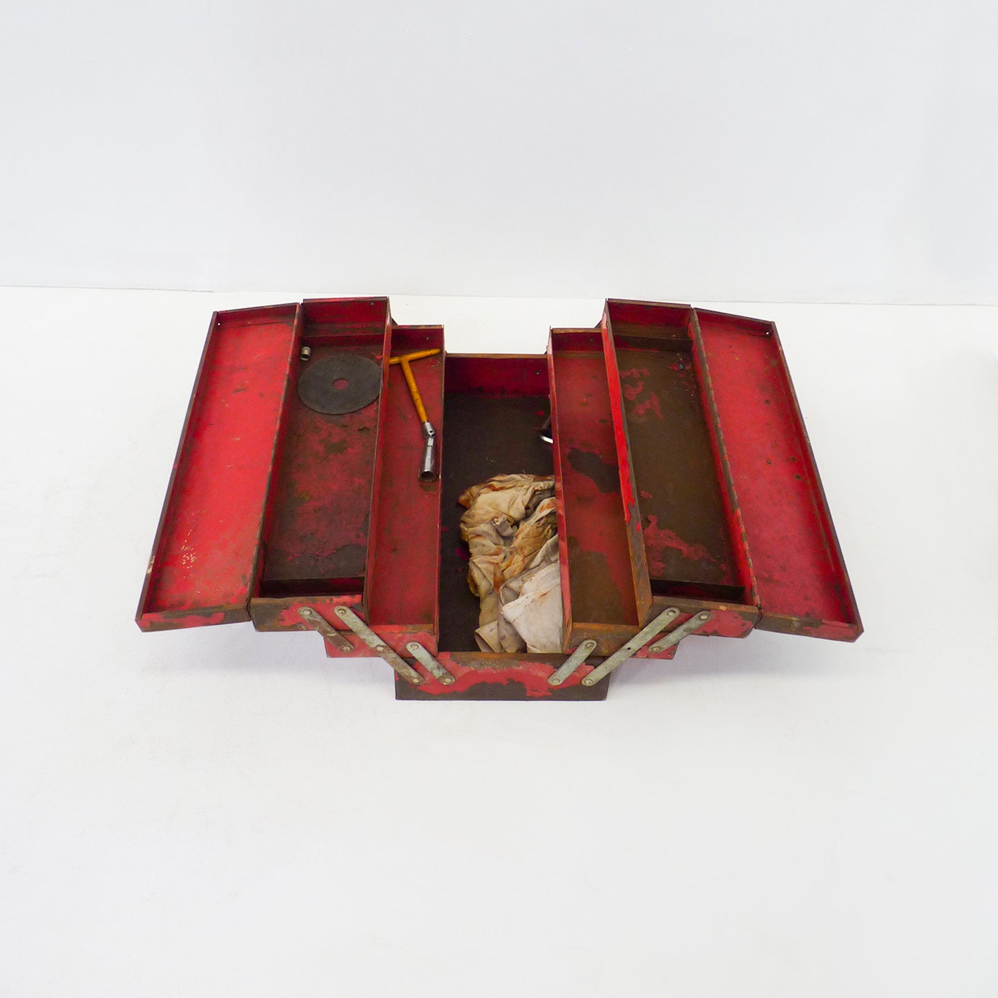 Aged Red Metal Expanding Toolbox