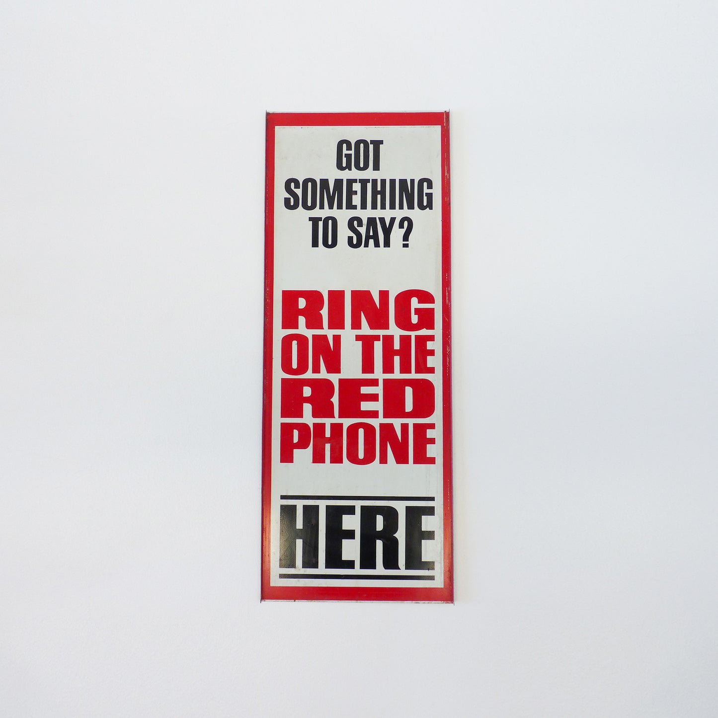 Vintage Red Payphone With Signage