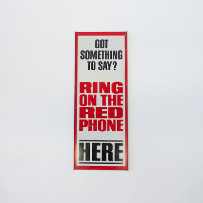 Vintage Red Payphone With Signage