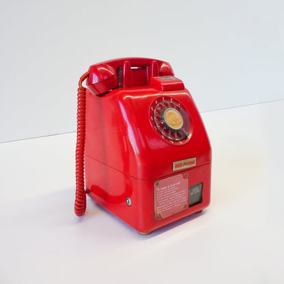 Vintage Red Payphone With Signage